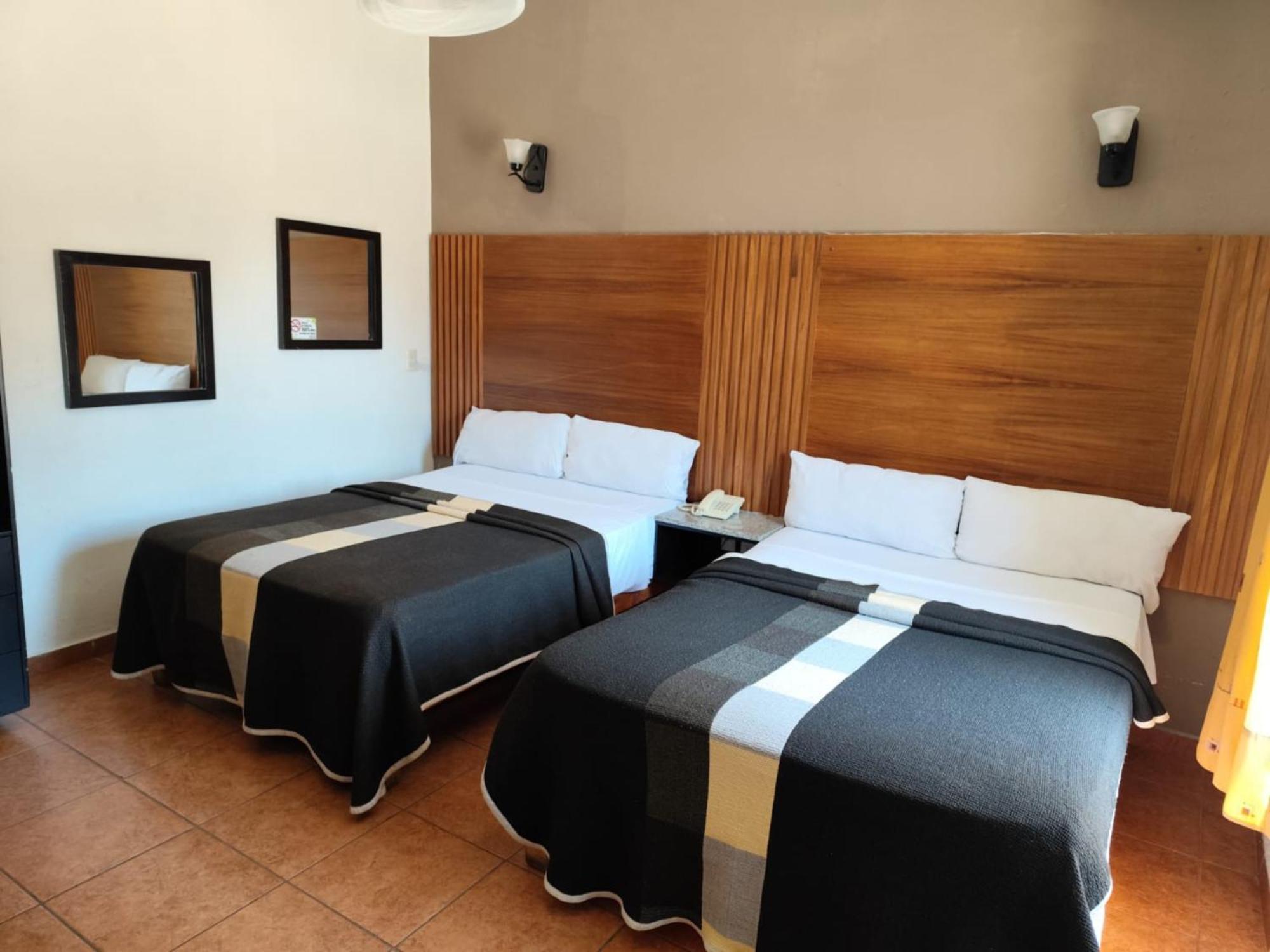 Hotel Aquiles Гвадалахара Номер фото